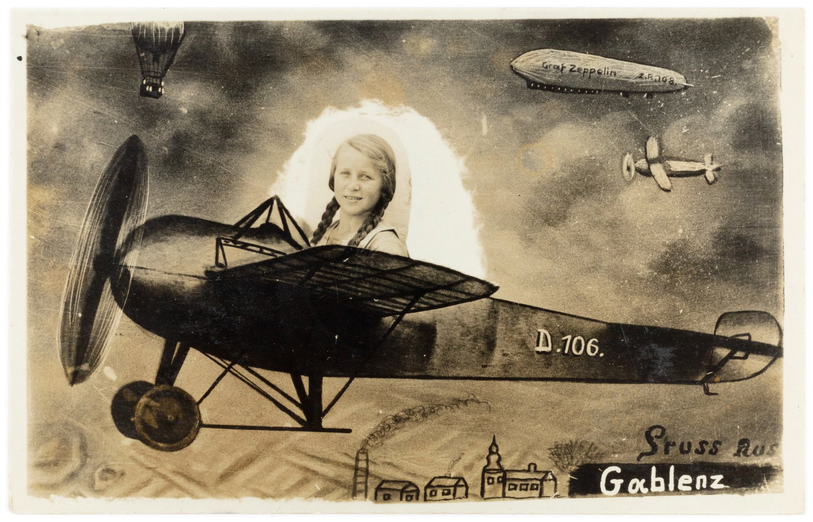 Mädchen in derselben Flugzeugvorlage D.106, mit Ballon und Luftschiff am Himmel; Gruß aus Gablenz